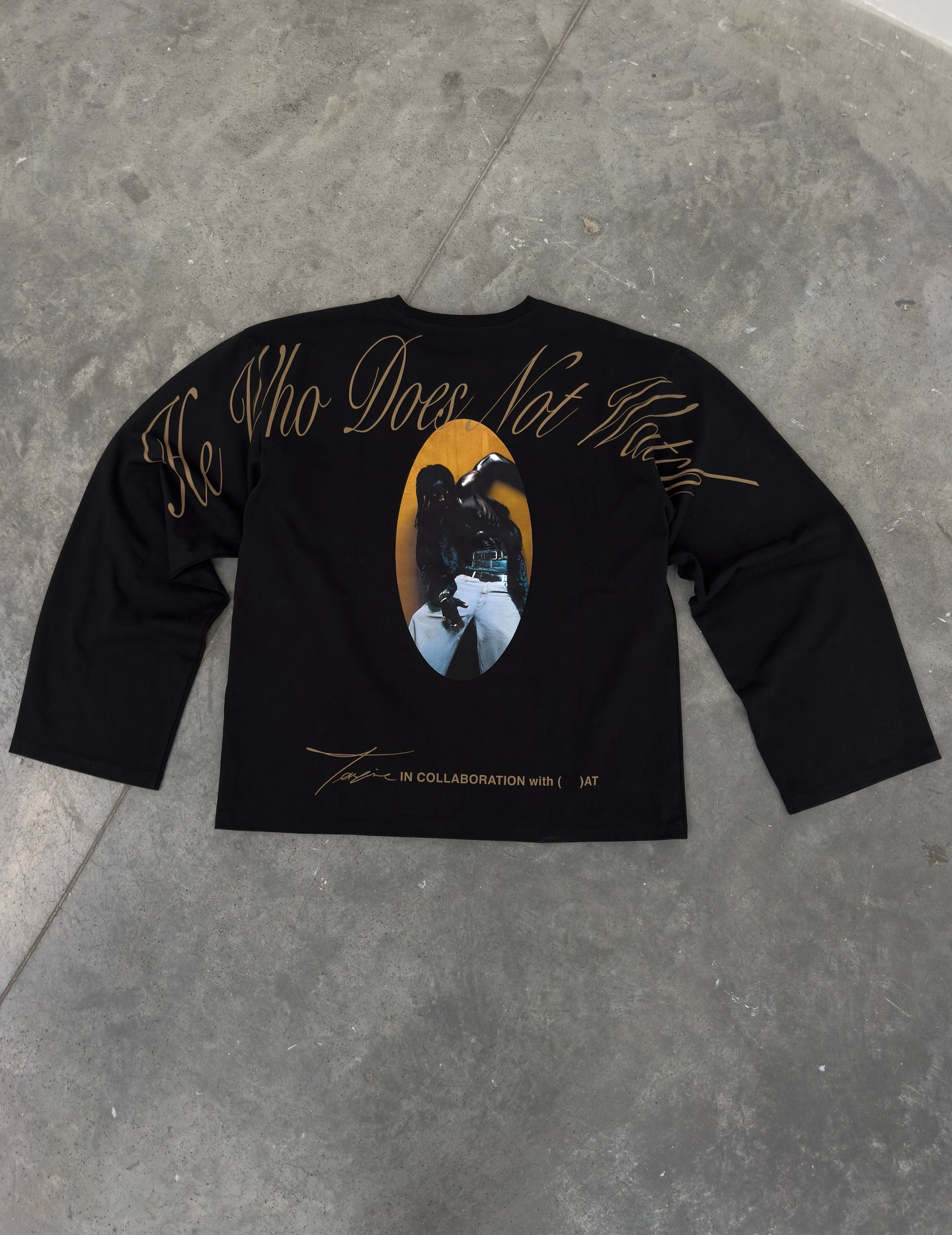 He Who Does Not Watch — t-shirt back